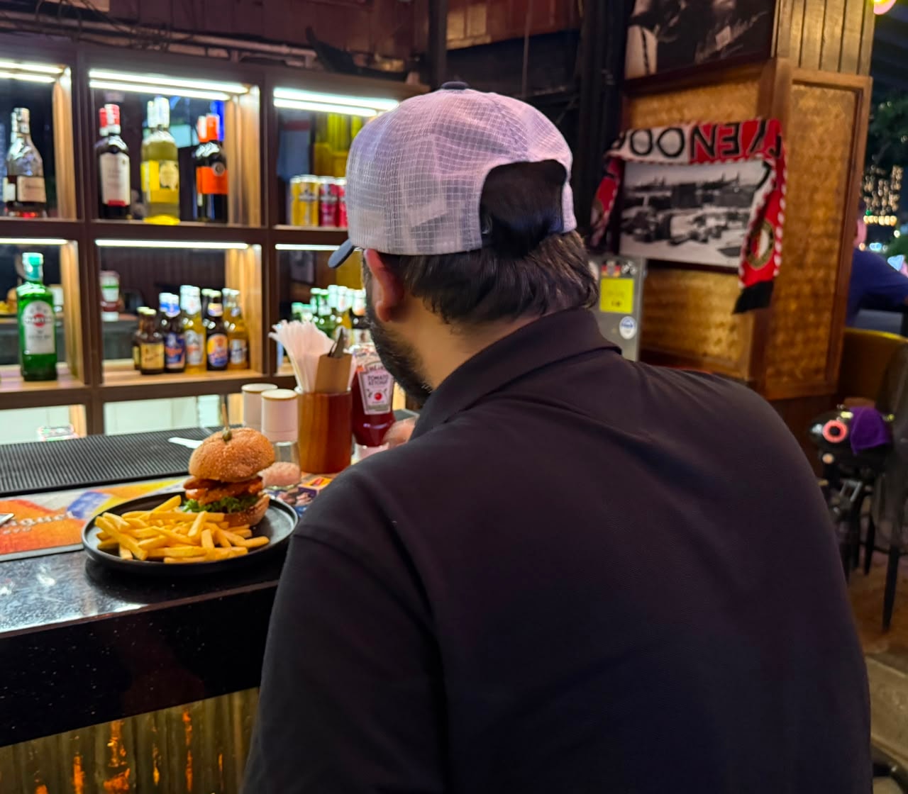 Burger and fries at Bamboo 2 Bar counter