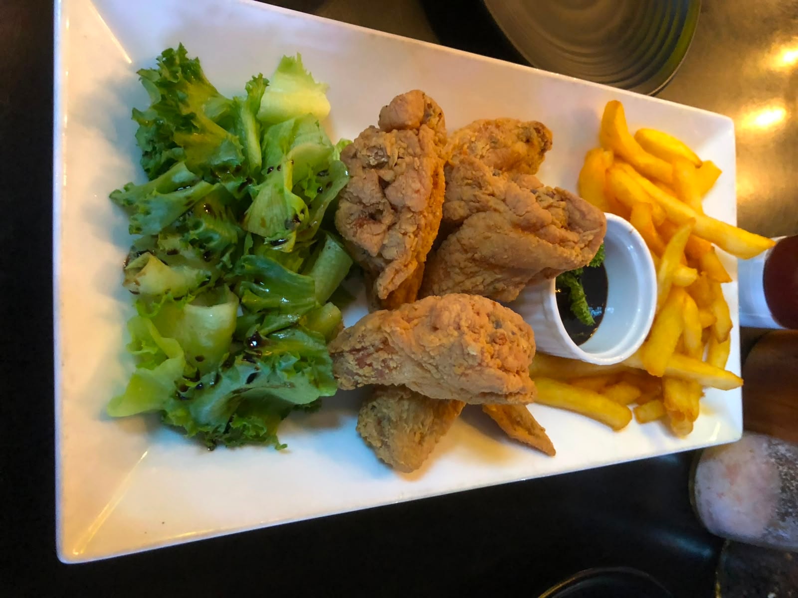 Fried chicken with fries at Bamboo 2 Bar