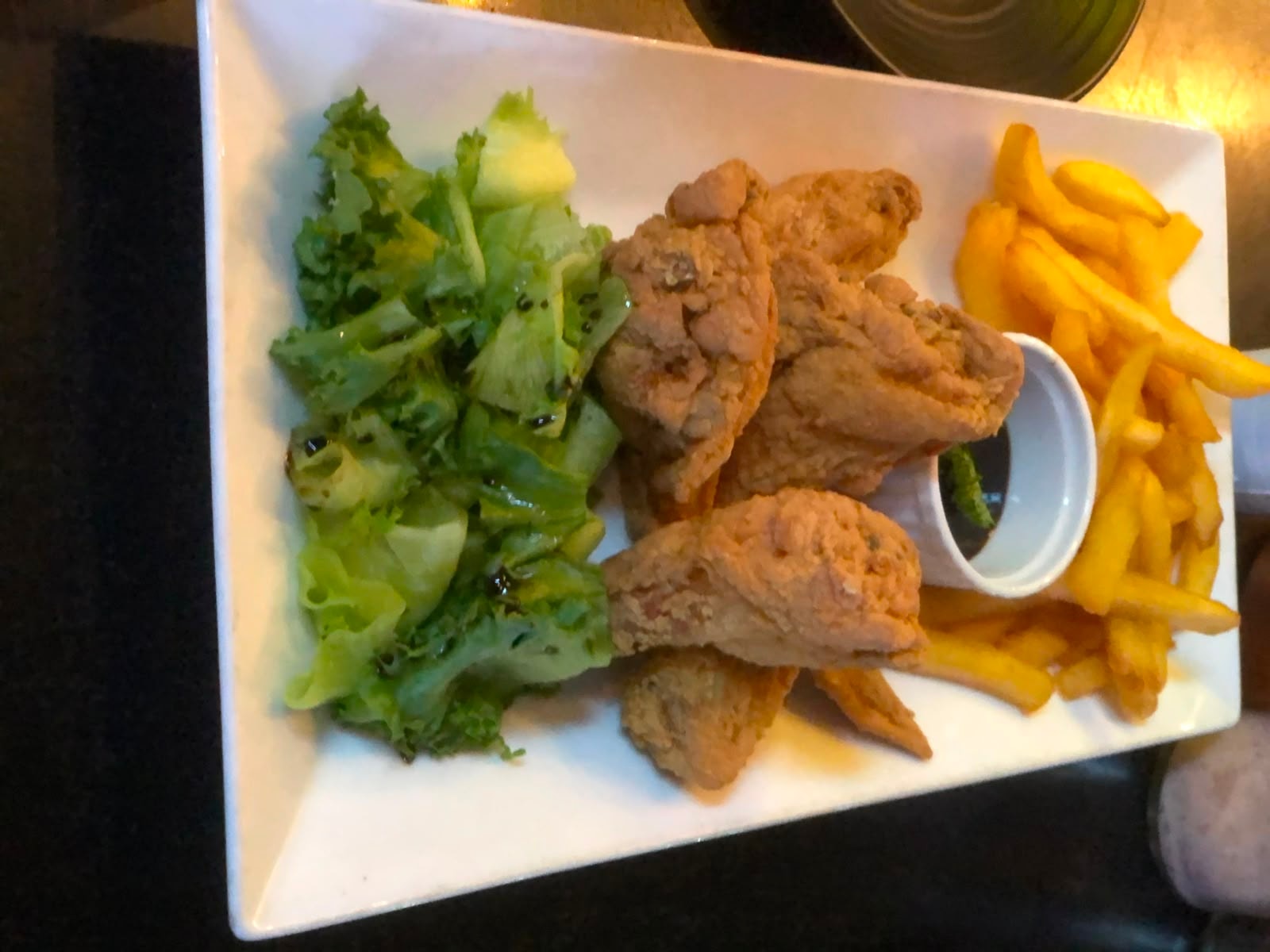 Fried chicken with lettuce and fries at Bamboo 2 Bar