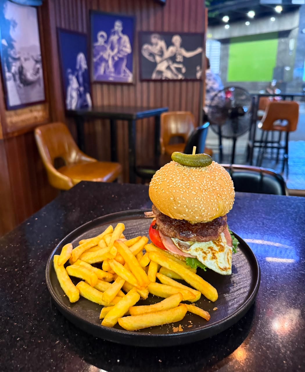 Gourmet burger and fries at Bamboo 2 Bar